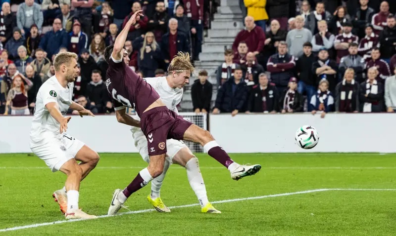 Oisin McEntee stretches to put Hearts in front