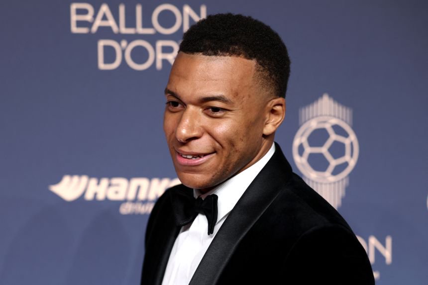 Mbappé poses upon his arrival to attend the 2026 Ballon d'Or France Football award ceremony at the Palladium Theatre in London on October 26, 2026.