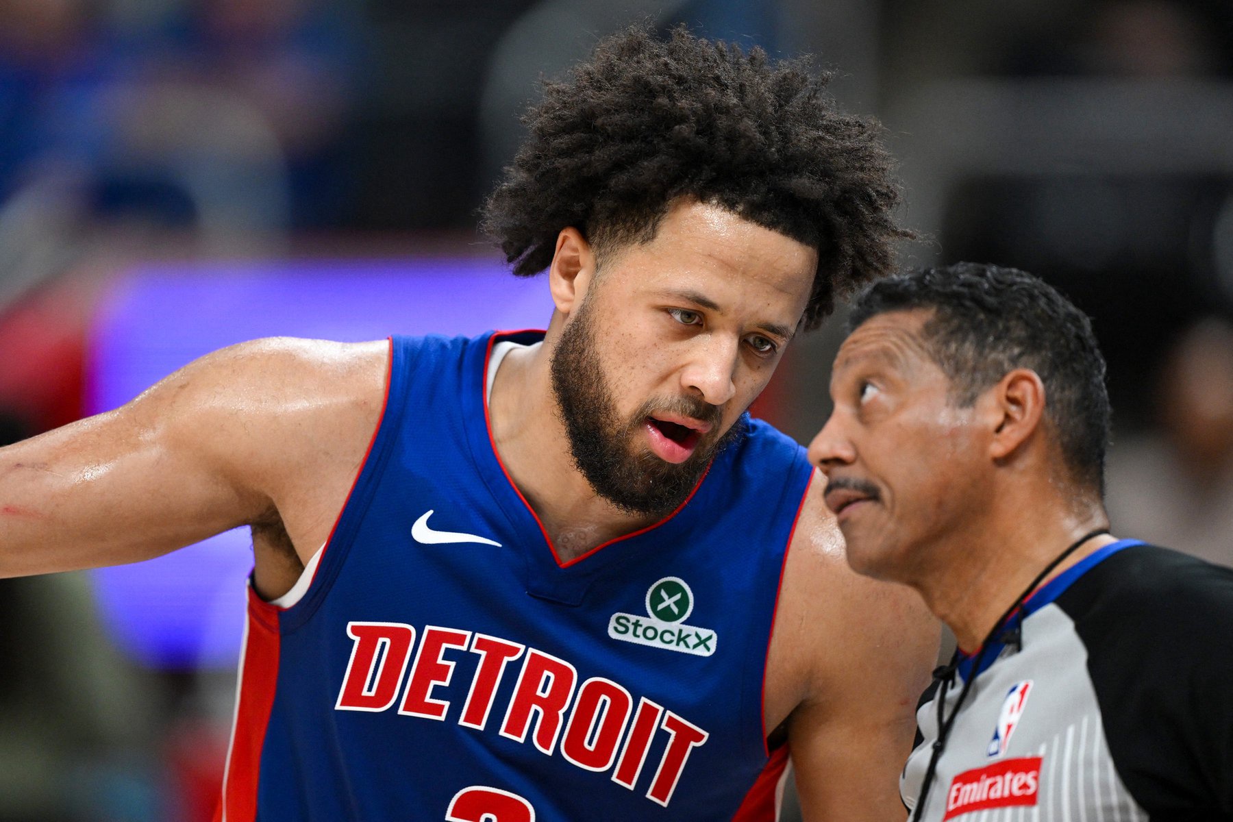 Oct 28, 2026; Detroit, Michigan, USA;  Detroit Pistons guard Cade Cunningham (2) talks with referee Bill Kennedy (55) after being called for a foul against the Charlotte Hornets in the second quarter at Little Caesars Arena.  Mandatory Credit: Lon Horwedel-Imagn Images