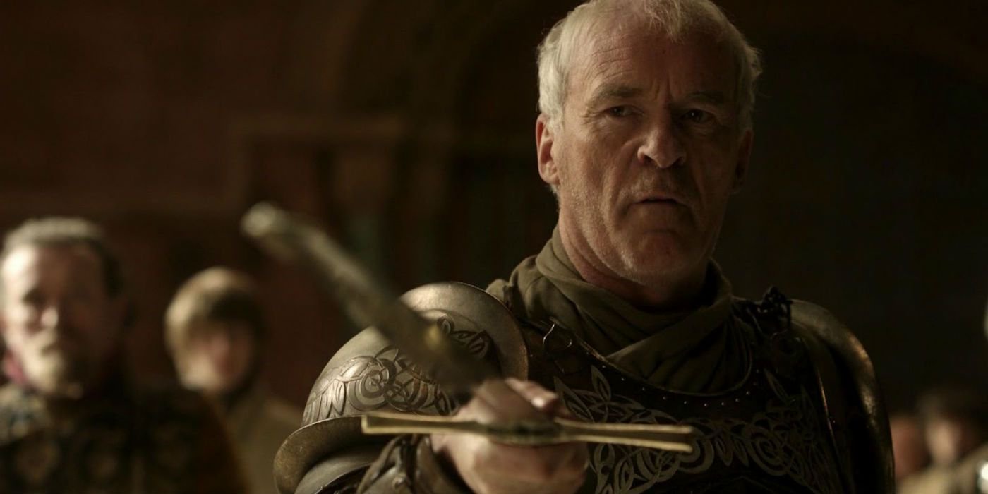 Ser Barristan Selmy is holding out his sword in defiance of Joffrey Boratheon.