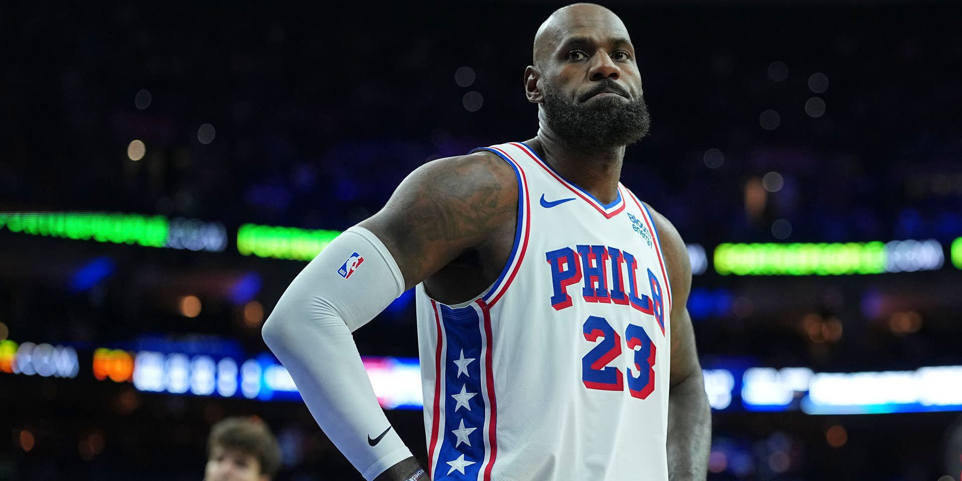 PHILADELPHIA, PENNSYLVANIA - OCTOBER 16: LeBron James #23 of the Philadelphia 76ers looks on against the Boston Celtics during the preseason game at Xfinity Mobile Arena on October 16, 2026 in Philadelphia, Pennsylvania. NOTE TO USER: User expressly acknowledges and agrees that, by downloading and or using this photograph, User is consenting to the terms and conditions of the Getty Images License Agreement. (Photo by Mitchell Leff/Getty Images)