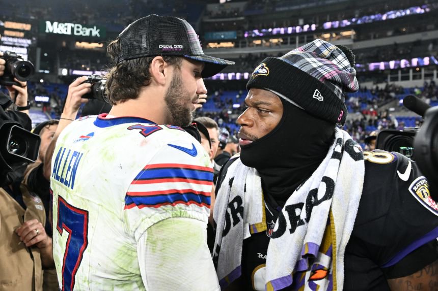 Buffalo Bills quarterback Josh Allen and Baltimore Ravens quarterback Lamar Jackson embrace after a game in 2024.