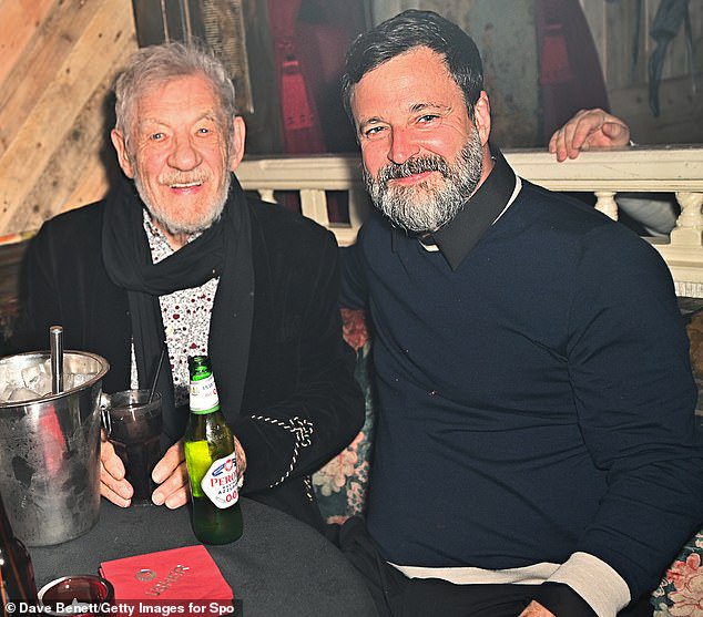 Sir Ian (L) was in great spirits and looked stylish in a black velvet blazer that boasted baroque embellishments