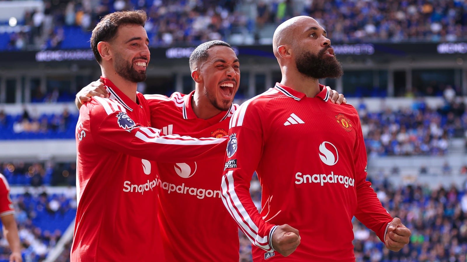 Bryan Mbeumo celebrates with Bruno Fernandes and Youri Tielemans of Manchester United after scoring their 1st goal against Everton at Hill Dickinson Stadium on September 6, 2026 during a 2026/27 PL match.