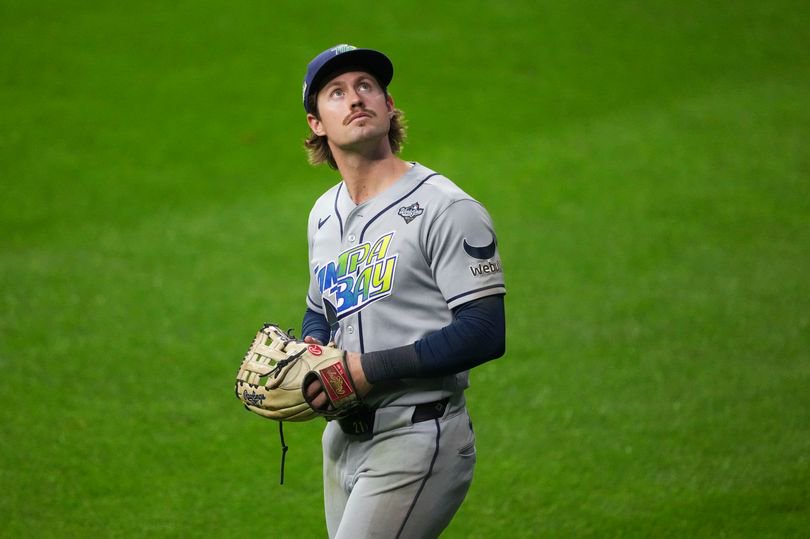 Jonny DeLuca #21 of the Tampa Bay Rays looks on during Game One