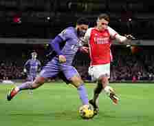 Joe Gomez of Liverpool and Jakub Kiwior of Arsenal in action