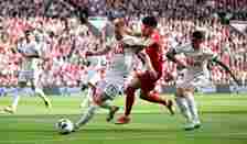(THE SUN OUT, THE SUN ON SUNDAY OUT) Luis Diaz of Liverpool competing with Dejan Kulusevski of Tottenham Hotspur  during the Premier League match b...