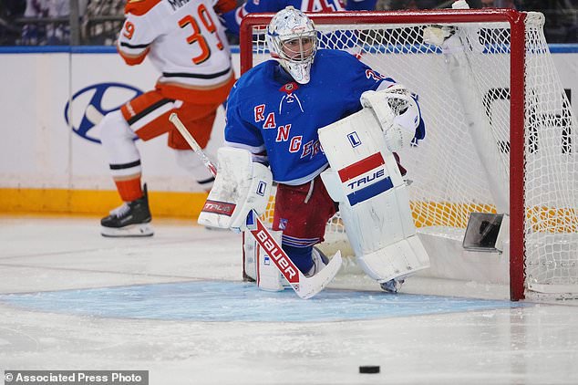 New York Rangers goaltender Dylan Garand (33) protects the net during the second period of an NHL hockey game against the Anaheim Ducks Monday, Oct. 19, 2026, in New York. (AP Photo/Frank Franklin II)