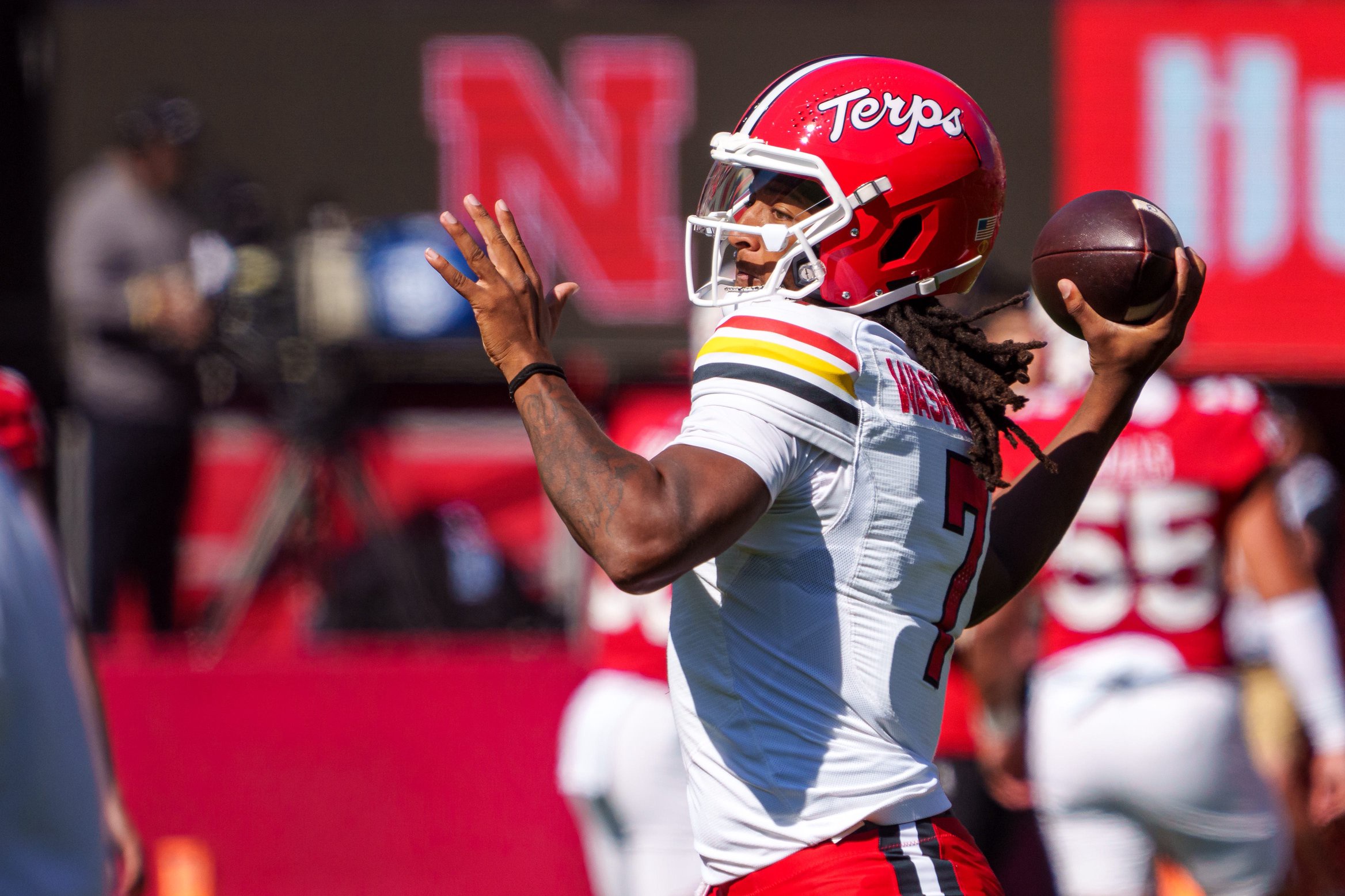 Oct 3, 2026; Lincoln, Nebraska, USA;  Maryland Terrapins quarterback Malik Washington (7) warms up before the game against the Nebraska Cornhuskers at Memorial Stadium.  Mandatory Credit: Dylan Widger-Imagn Images