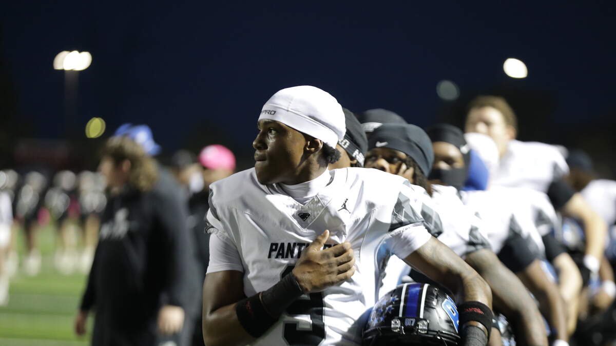 North Crowley defensive back Tyler Bush stands on the sideline during the national anthem ahead of a district game against Mansfield at Newsom Stadium in Mansfield, Texas, on Thursday, Oct. 29, 2026.