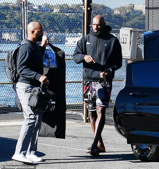LeBron James is spotted arriving in New York at a helipad on the west side of Manhattan