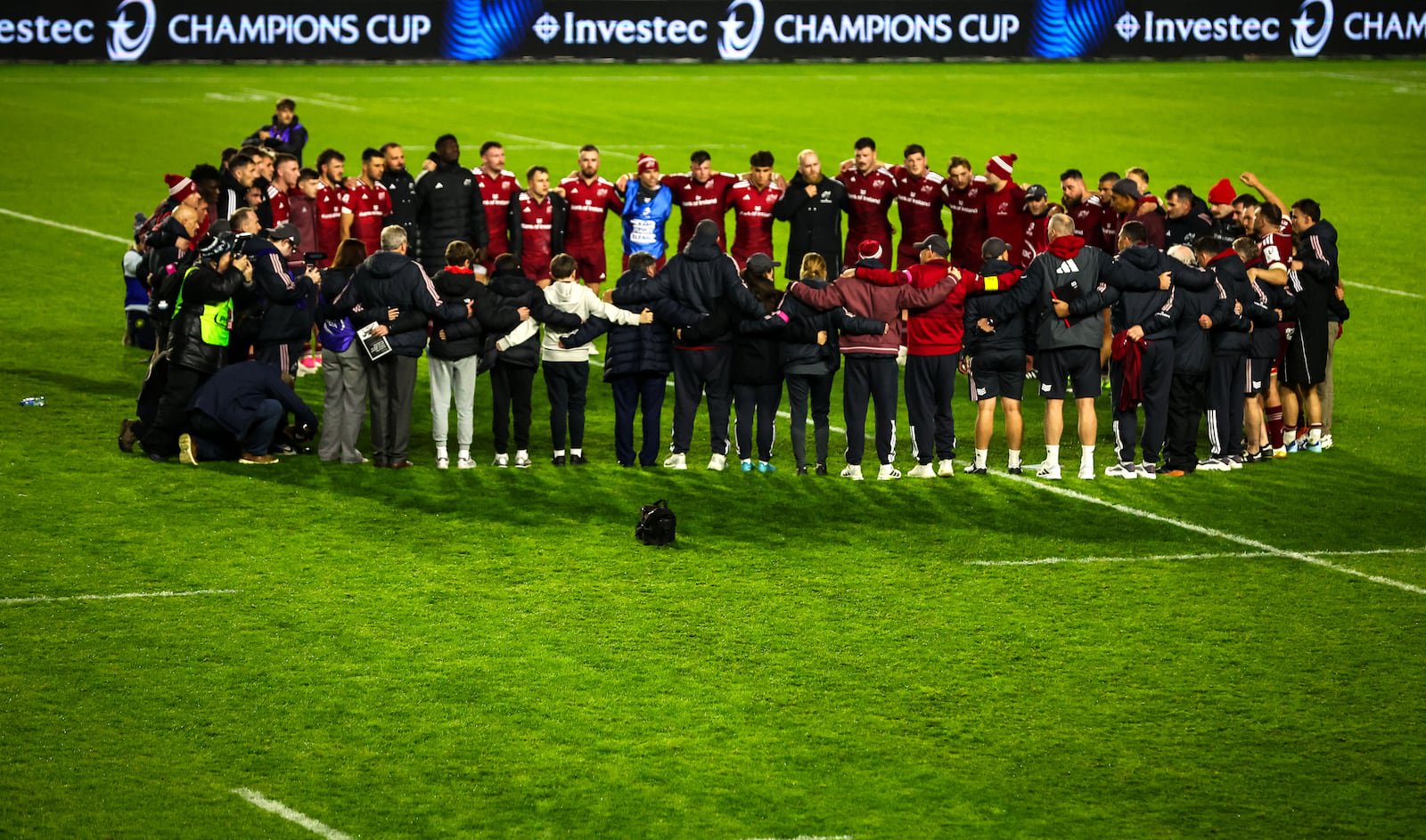 Munster huddle to sing Stand up and Fight in honour of Anthony Foley after Saturday's game against Racing 92 at Páirc Uí Chaoimh. Photograph: Dan Clohessy/Inpho