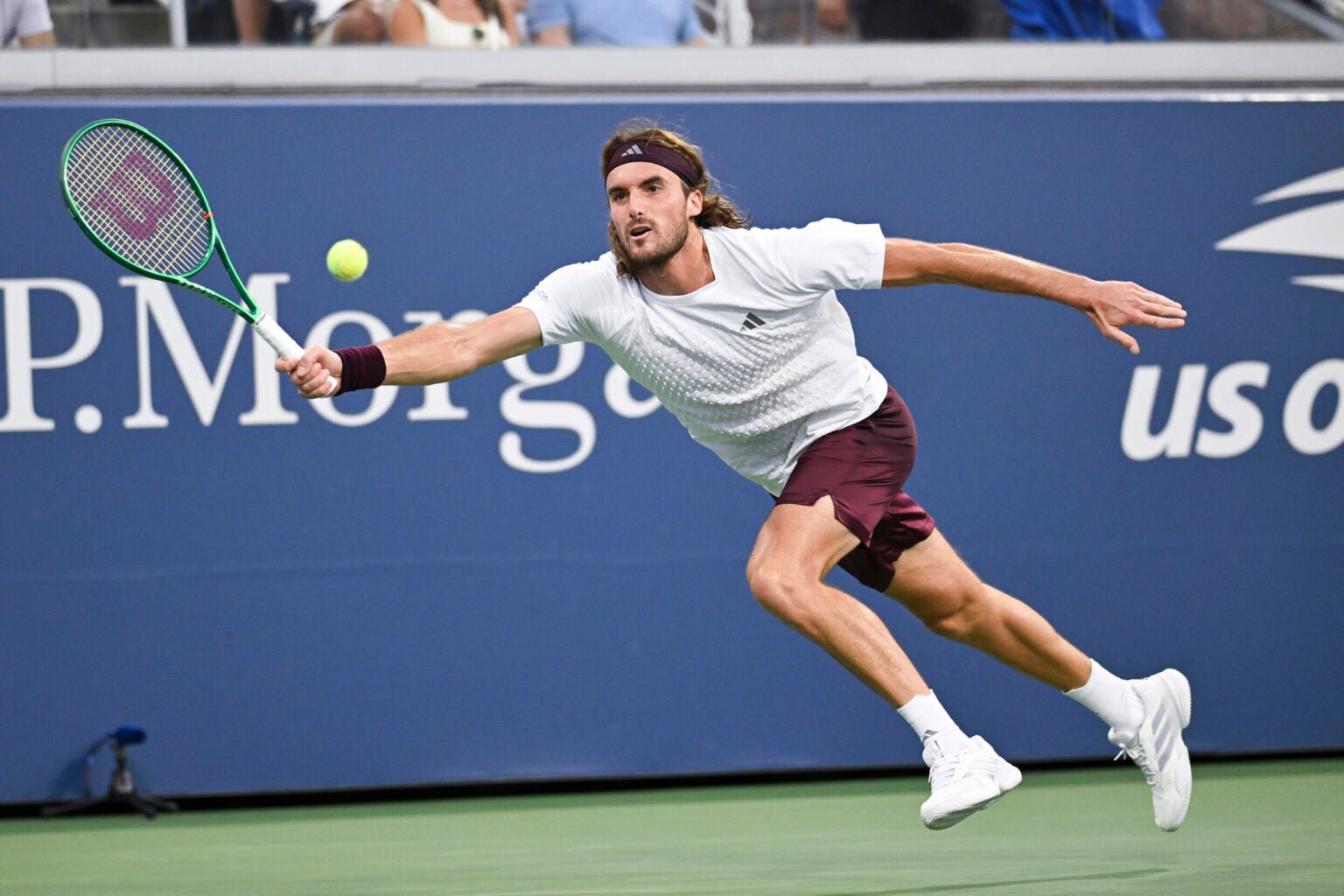 Stefanos Tsitsipas reaches for the ball at the US Open.
