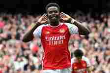 Bukayo Saka celebrates scoring the opening goal from the penalty spot during the English Premier League football match between Arsenal and Bournemouth at the Emirates Stadium