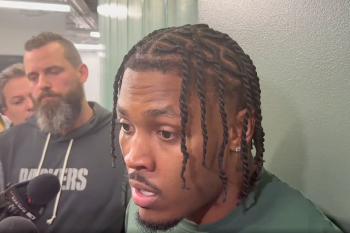 Josh Jacobs speaks to the media