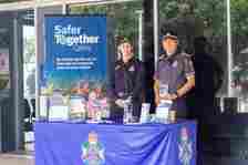 Officer and PLO at Safer Together stand