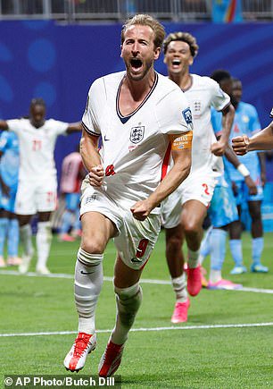 Kane celebrates scoring for England at the World Cup