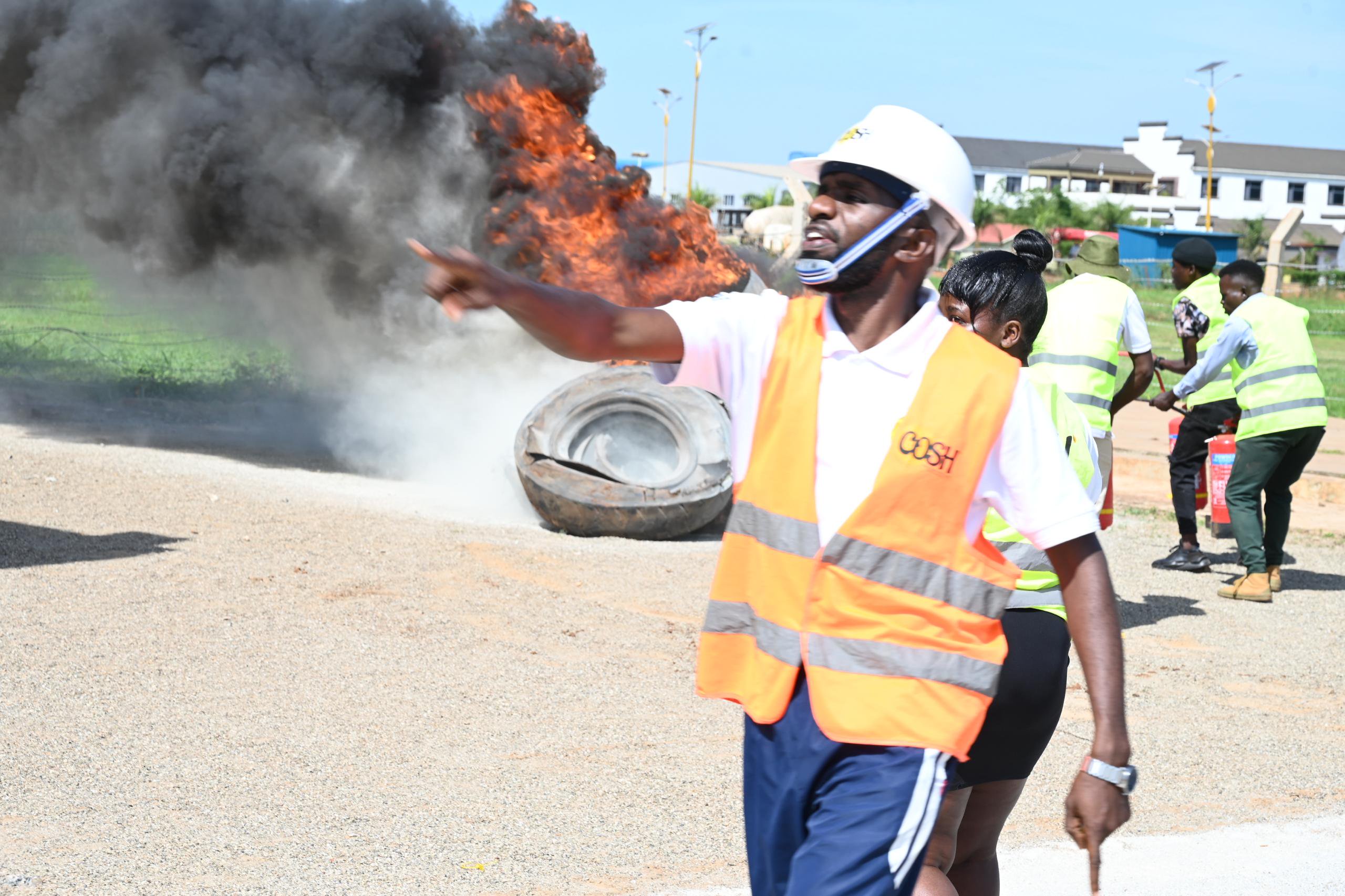 Expert Badru Ssenfuka offers guidance during Sino Uganda Park fire drill