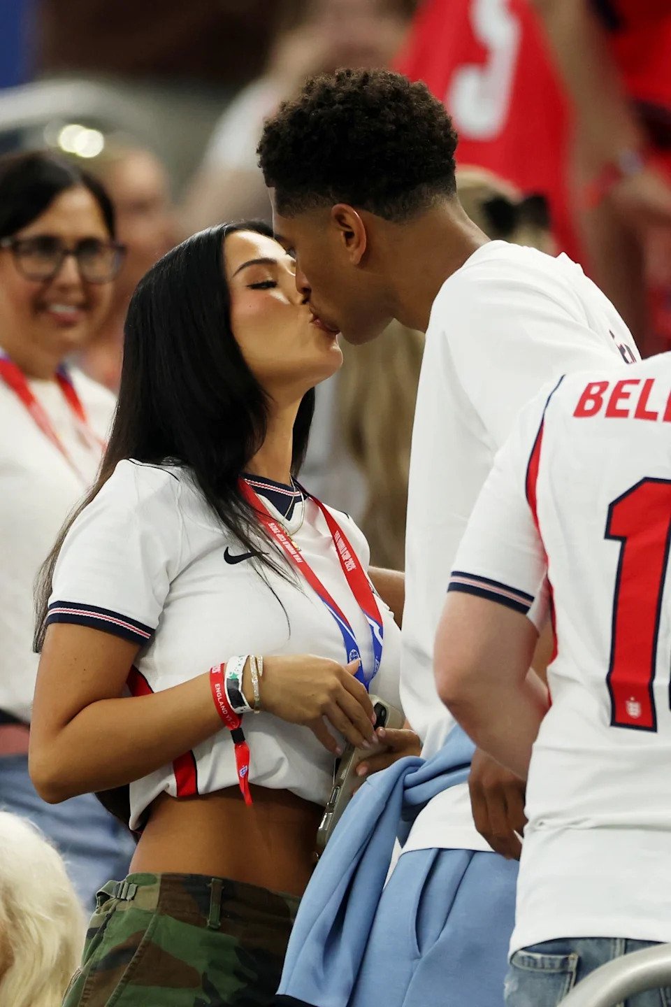 Ashlyn Castro and Jude Bellingham share a kiss at the England v Croatia match during the FIFA World Cup