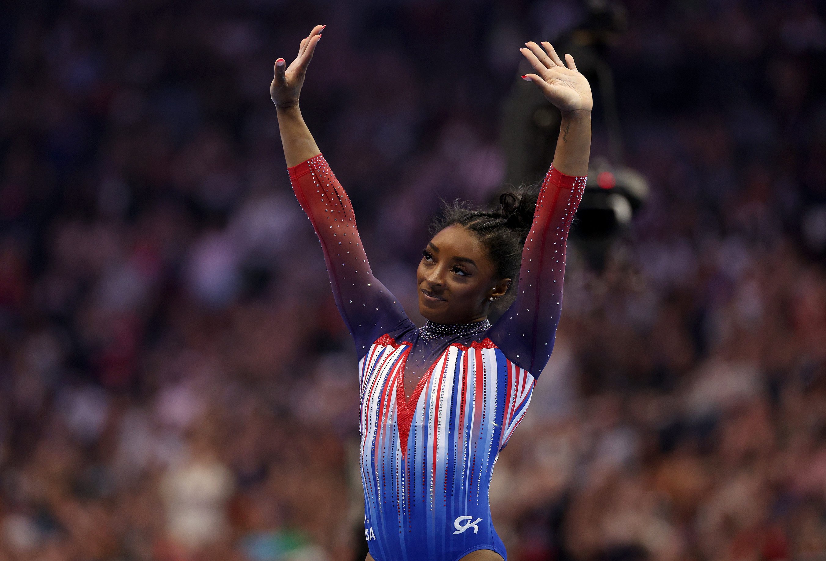 Simone Biles reacts after competing on the floor exercise on Day Four of the 2024 U.S. Olympic Team Gymnastics Trials at Target Center on June 30, 2024 in Minneapolis, Minnesota. 