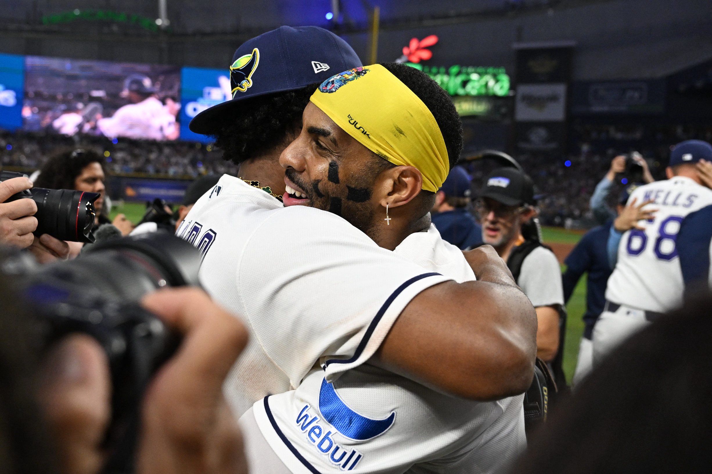Junior Caminero and Yandy Diaz celebrate after the Game 6 win.