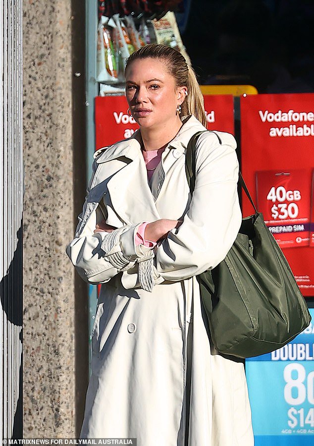 She refused to answer questions when she was approached by the Daily Mail in Sydney's CBD in 2023