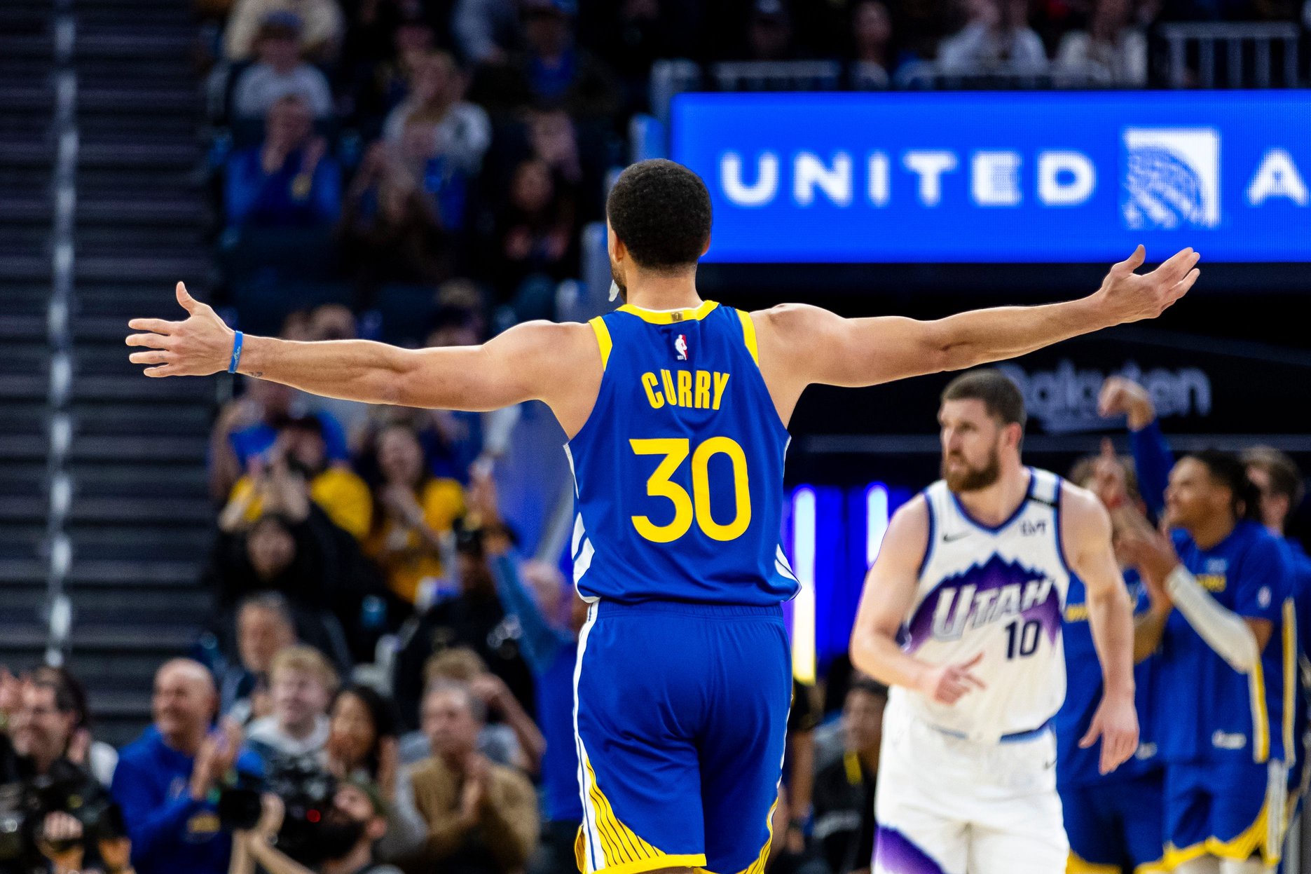 Jan 3, 2026; San Francisco, California, USA; Golden State Warriors guard Stephen Curry (30) reacts after a teammate scored against the Utah Jazz during the third quarter at Chase Center. Mandatory Credit: John Hefti-Imagn Images