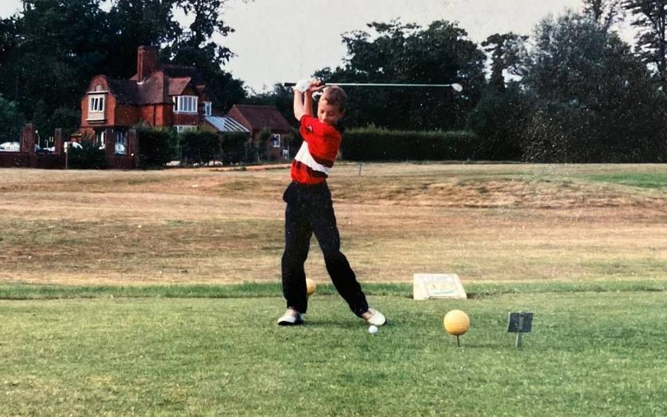Neil Sykes swinging a golf club when he was younger