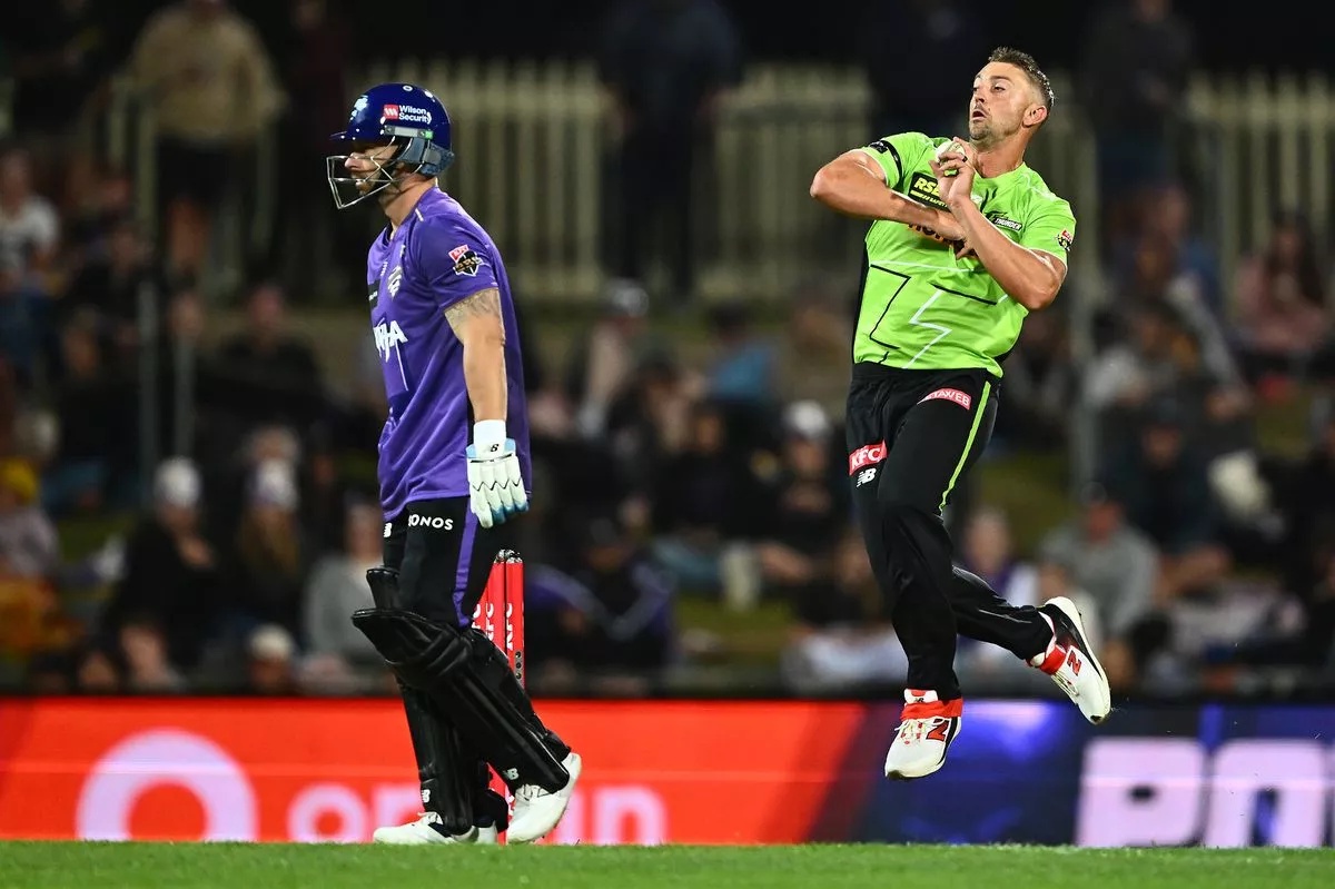 HOBART, AUSTRALIA - DECEMBER 16: Daniel Sams of the Thunder bowls during the BBL match between Hobart Hurricanes and Sydney Thunder at Ninja Stadium, on December 16, 2025, in Hobart, Australia (Photo by Steve Bell/Getty Images)