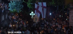 Georgian protesters against ‘Russia-style’ media law mark Orthodox Easter with candlelight vigil