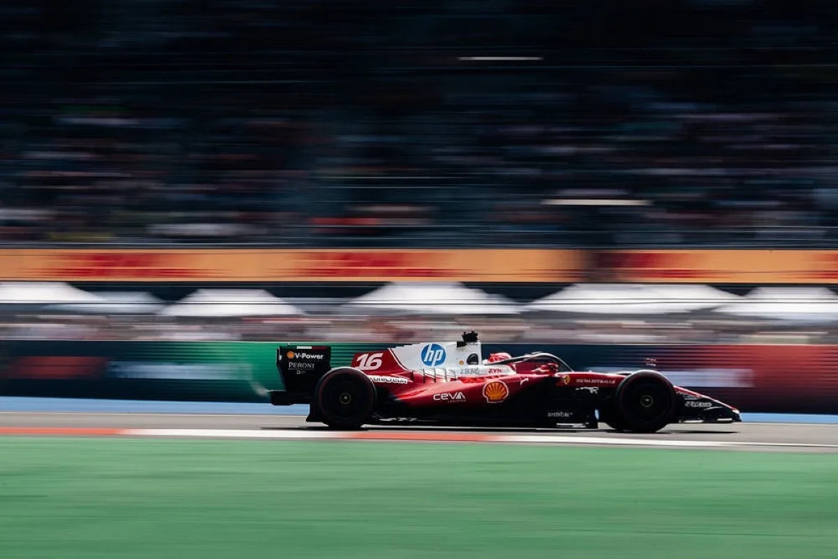 Ferrari Formula 1 car number 16 racing past the trackside, with HP, Shell and Ceva livery visible at the Mexico City circuit.