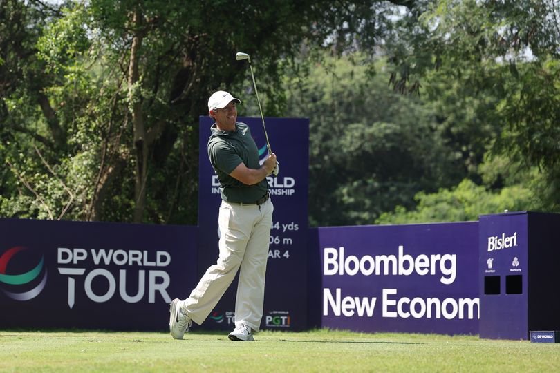 Rory McIlroy hits an iron shot at Delhi Golf Club