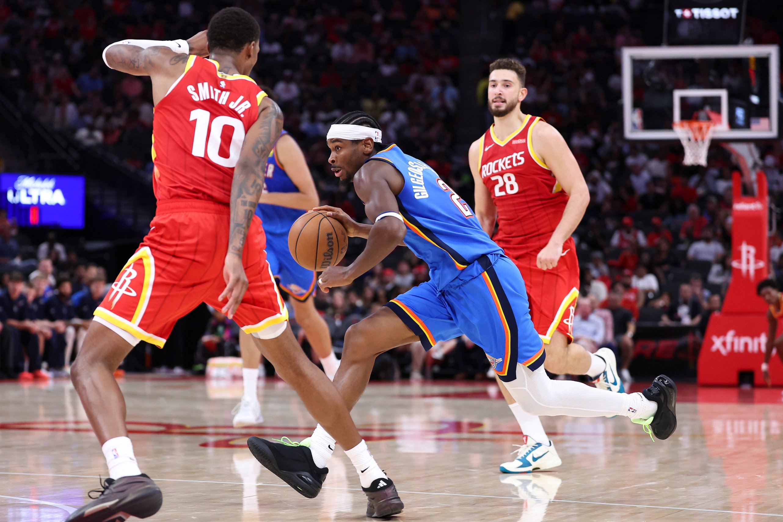 Oct 15, 2026; Houston, Texas, USA; Oklahoma City Thunder guard Shai Gilgeous-Alexander (2) dribbles the ball during the third quarter against the Houston Rockets at Toyota Center. Mandatory Credit: Troy Taormina-Imagn Images