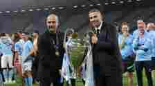 Khaldoon Al Mubarak, chairman of Manchester City and Manchester City Manager Pep Guardiola pose with the Champions League Trophy