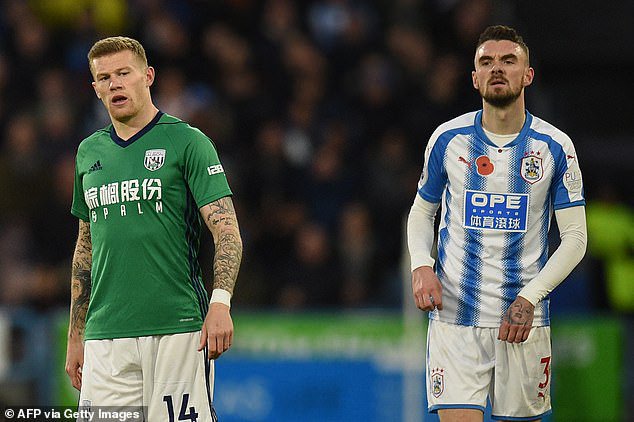 McClean pictured in action for West Brom against Huddersfield in 2017 not wearing the poppy