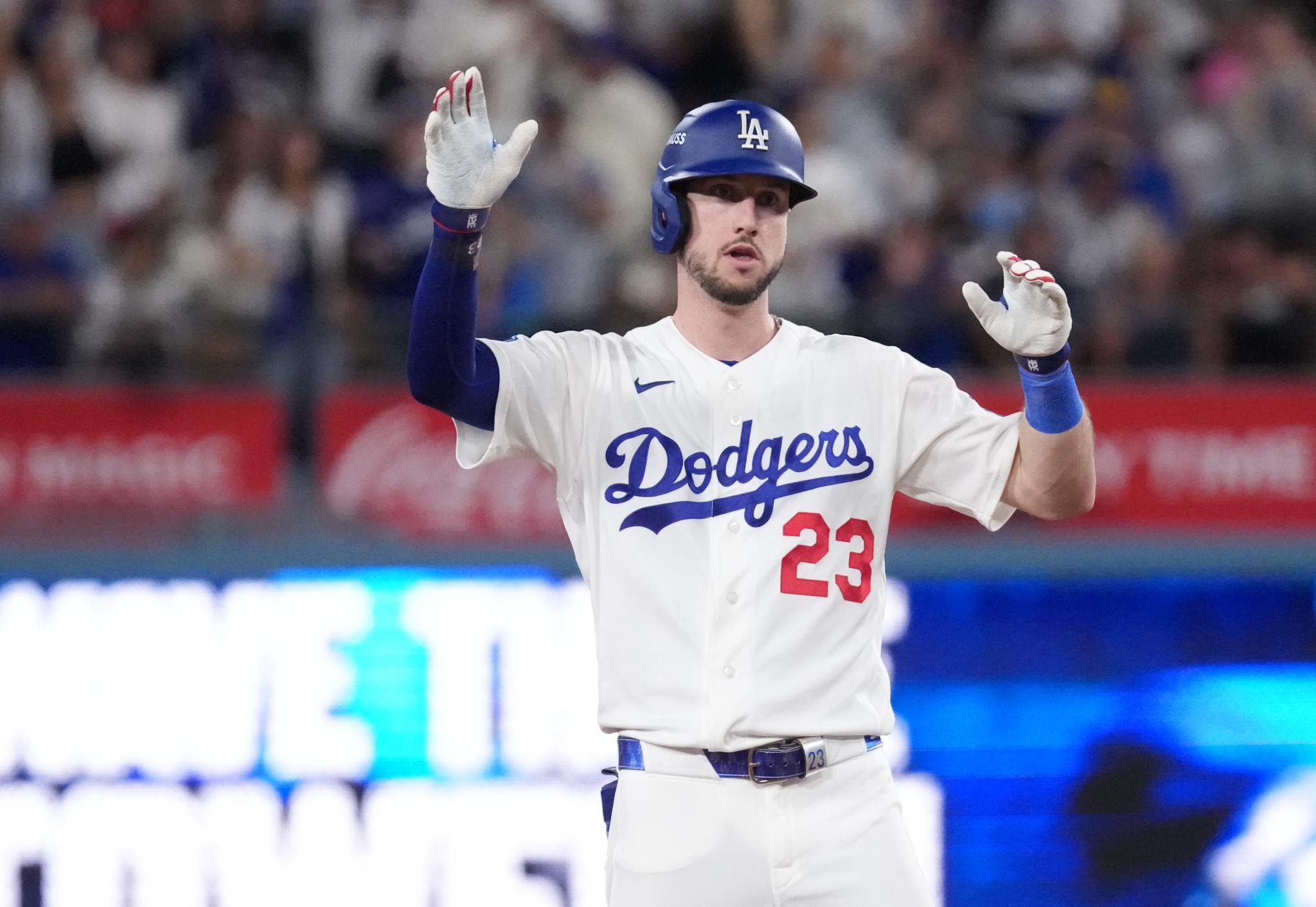 Los Angeles Dodgers outfielder Kyle Tucker reacts after hitting a double against the Milwaukee Brewers during the NLCS.