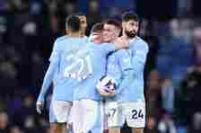 Phil Foden is congratulated by his teammates after scoring a hat-trick at the Etihad Stadium.