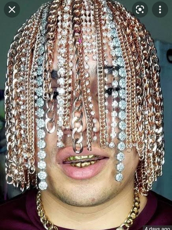 Meet A RAPPER Causing COMMOTION Online With Hair Studded In Gold Chains And Diamonds