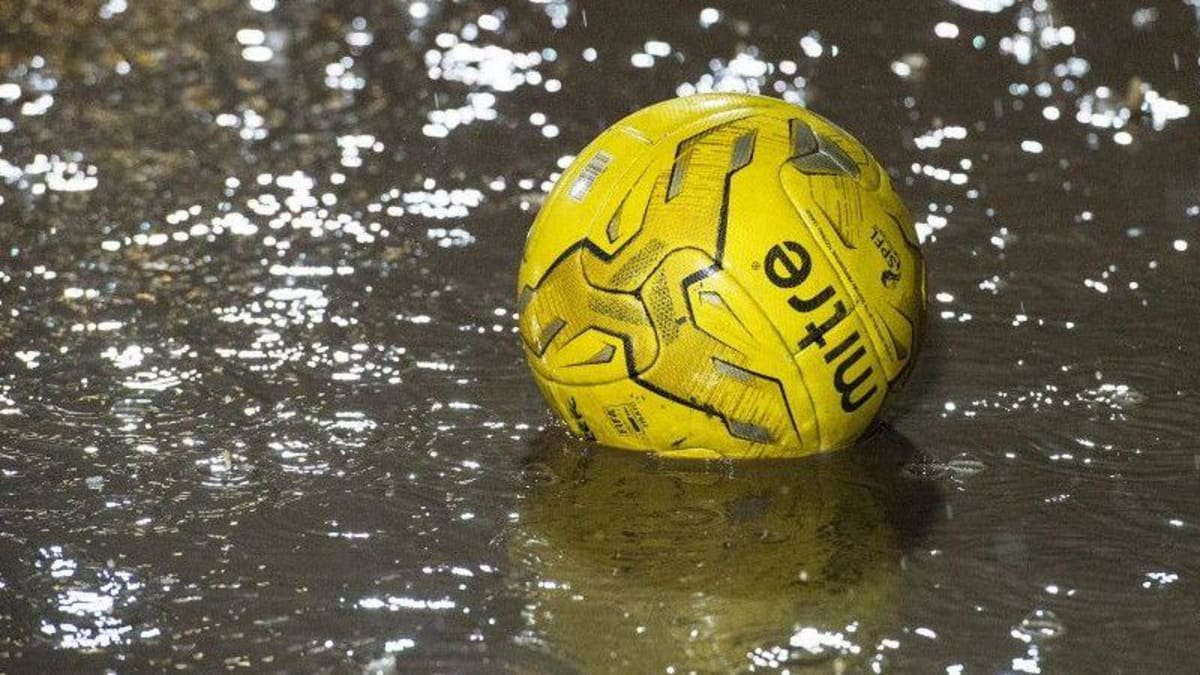 A football in a puddle