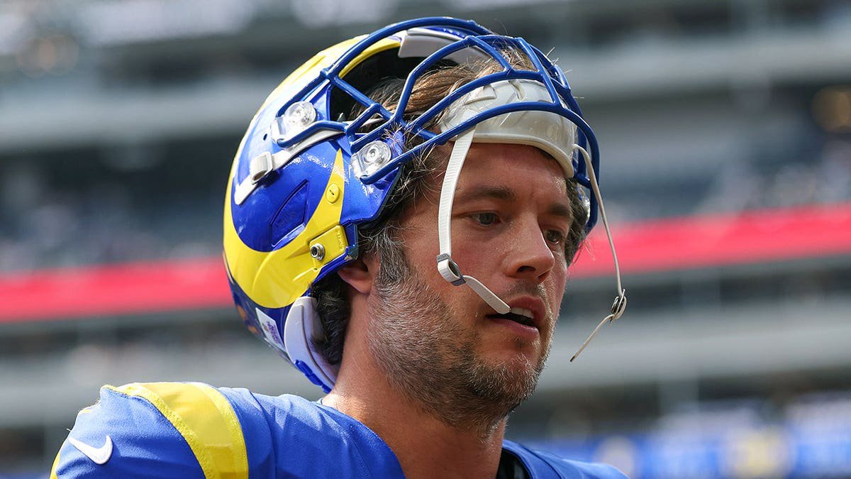 Matthew Stafford of the Los Angeles Rams looks on before a game at SoFi Stadium.