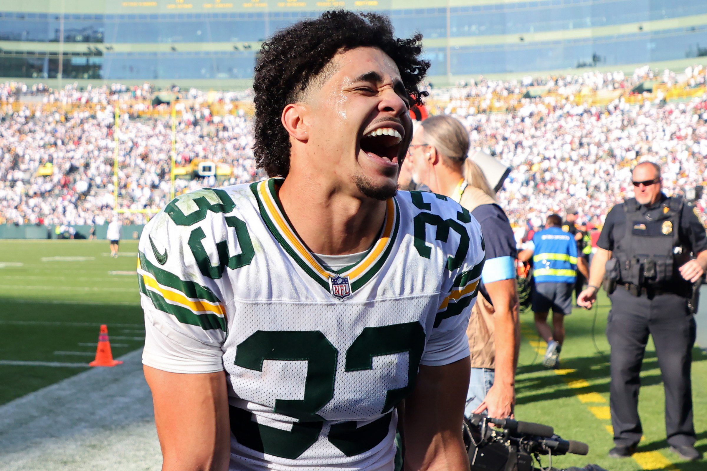 GREEN BAY, WISCONSIN - OCTOBER 20: Evan Williams #33 of the Green Bay Packers celebrates after beating the Houston Texans 24-22 at Lambeau Field on October 20, 2024 in Green Bay, Wisconsin. (Photo by Stacy Revere/Getty Images)