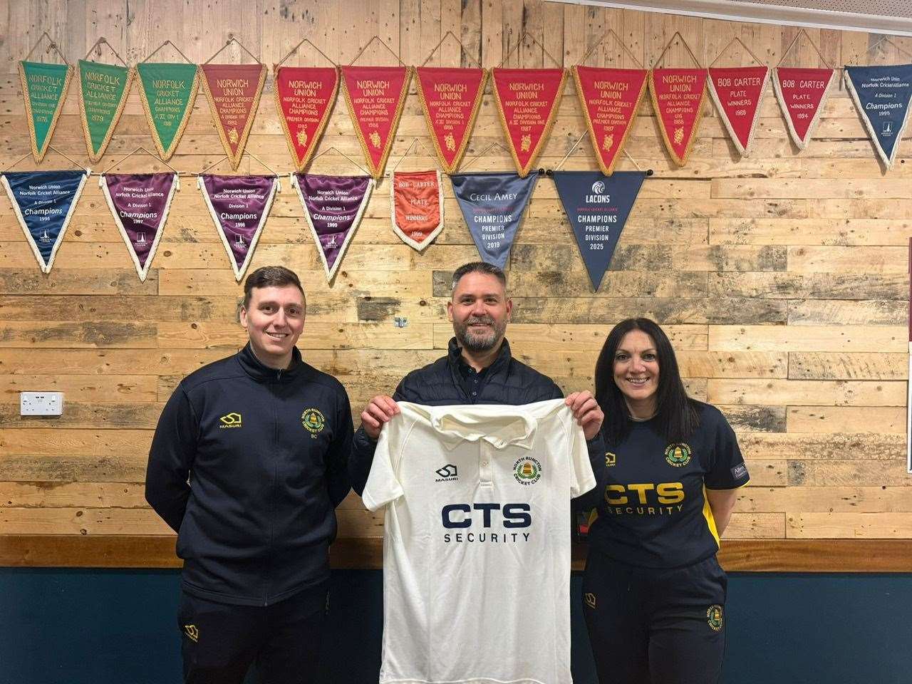 Pictured centre is Darryn Faivelowitz, from CTS Security, with North Runcton captains Ben Coote and Roberta de Luca Gilbert following the announcement of a new three-year sponsorship deal during the club's centenary season.