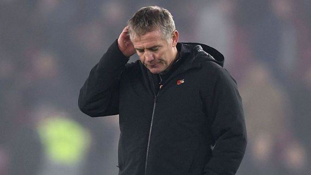 Wrexham boss Phil Parkinson looks dejected