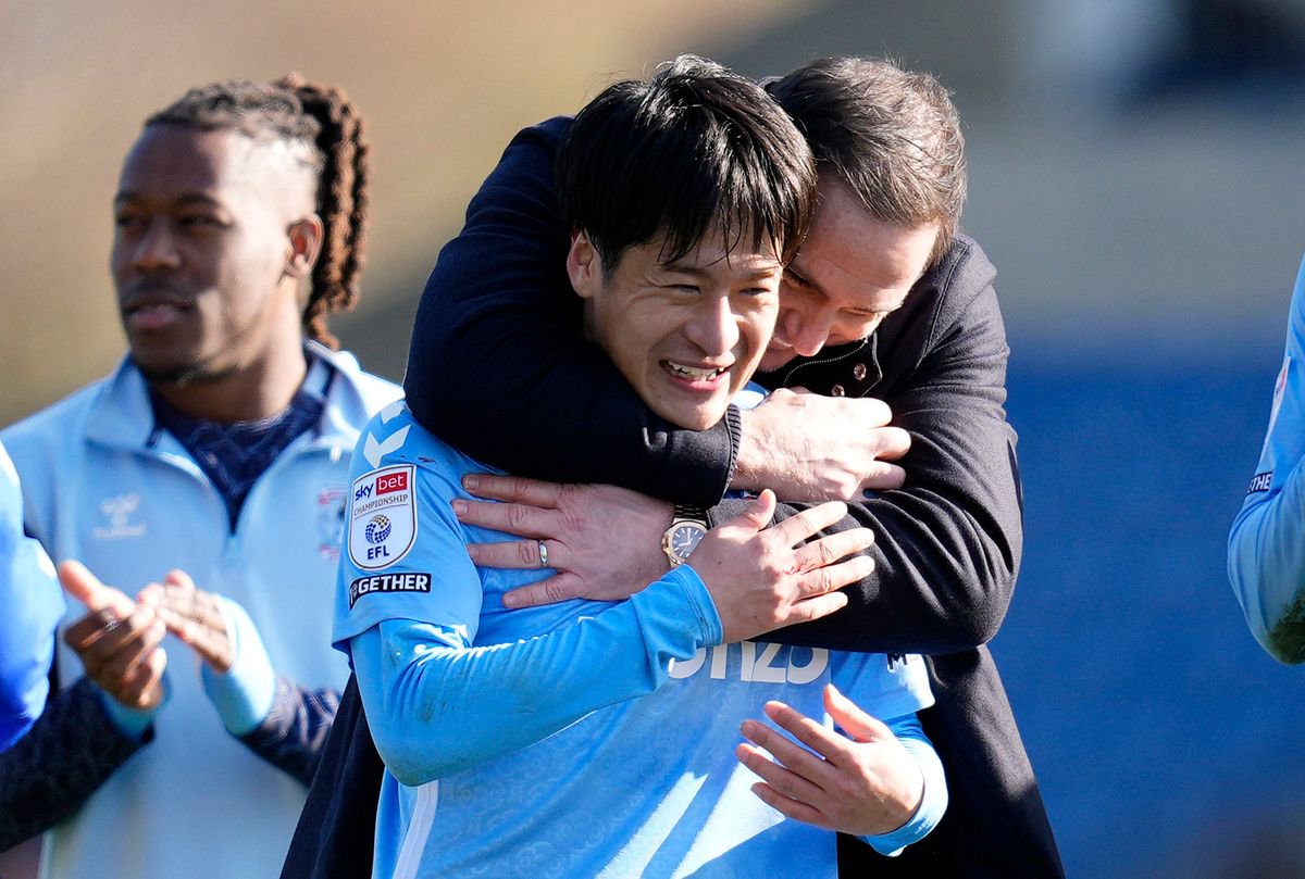 Coventry City's Tatsuhiro Sakamoto (left) is congratulated by head coach Frank Lampard 
