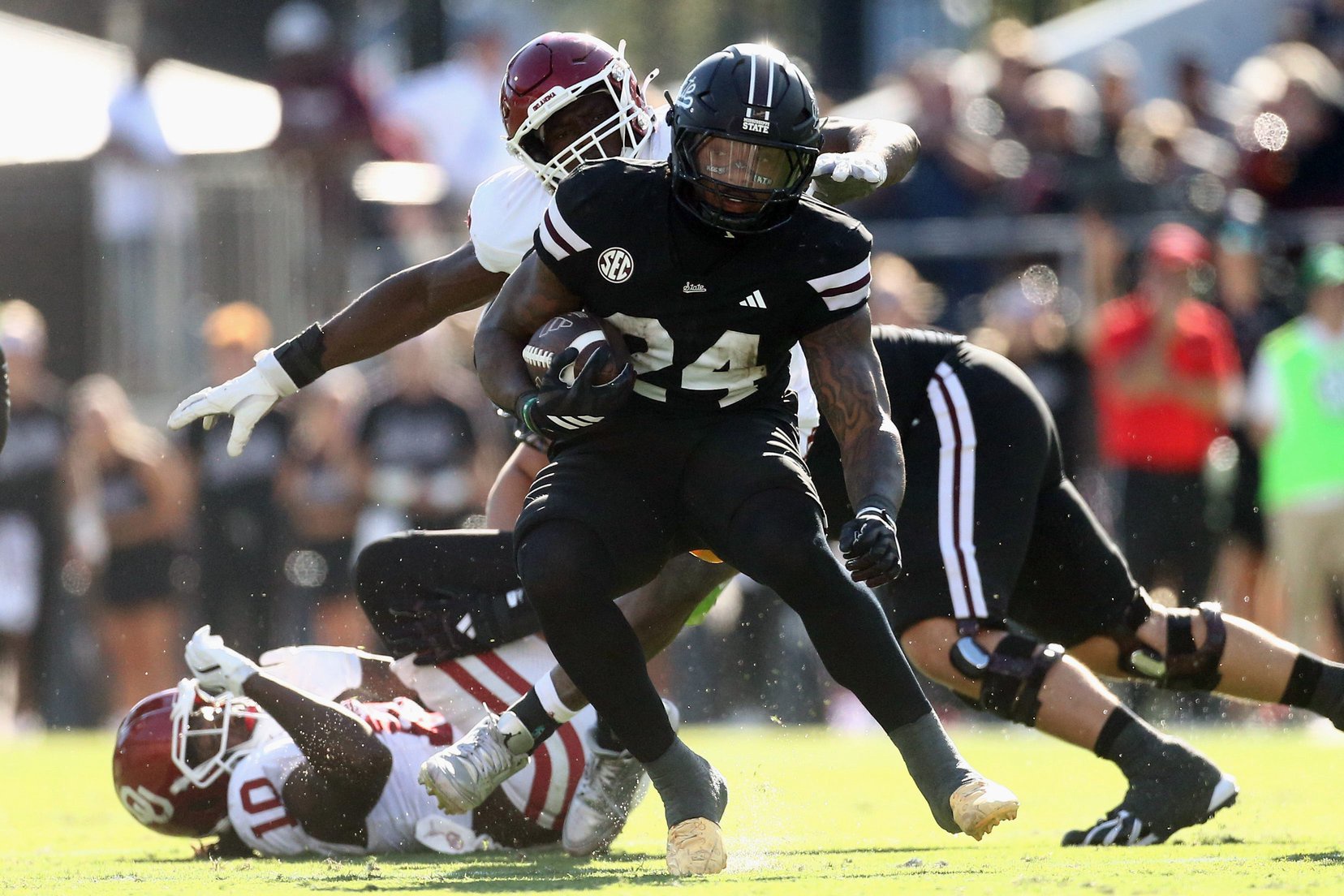 Oct 24, 2026; Starkville, Mississippi, USA;  Mississippi State Bulldogs running back Fluff Bothwell (24) runs the ball during the second quarter against the Oklahoma Sooners at Davis Wade Stadium at Scott Field.  Mandatory Credit: Petre Thomas-Imagn Images