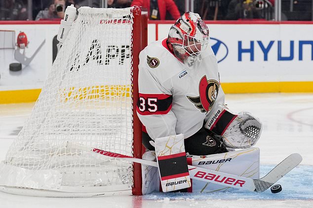 Ottawa Senators goaltender Linus Ullmark makes a save during the second period of an NHL hockey game against the New Jersey Devils in Newark, N.J., Monday, Oct. 12, 2026. (AP Photo/Seth Wenig)