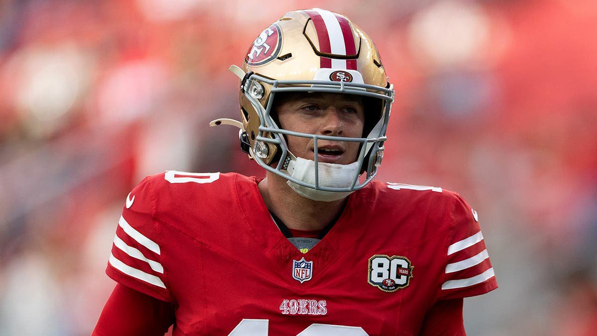 Mac Jones warms up before the game at Levi's Stadium.