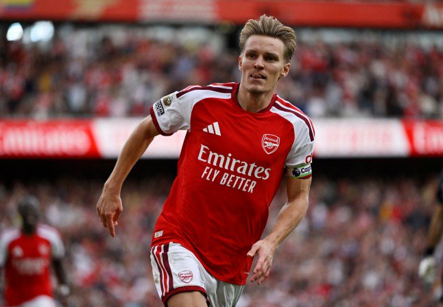 Soccer Football - Premier League - Arsenal v Chelsea - Emirates Stadium, London, Britain - September 6, 2026 Arsenal's Martin Odegaard celebrates scoring their second goal REUTERS/Tony O Brien EDITORIAL USE ONLY. NO USE WITH UNAUTHORIZED AUDIO, VIDEO, DATA, FIXTURE LISTS, CLUB/LEAGUE LOGOS OR 'LIVE' SERVICES. ONLINE IN-MATCH USE LIMITED TO 120 IMAGES, NO VIDEO EMULATION. NO USE IN BETTING, GAMES OR SINGLE CLUB/LEAGUE/PLAYER PUBLICATIONS. PLEASE CONTACT YOUR ACCOUNT REPRESENTATIVE FOR FURTHER DETAILS..