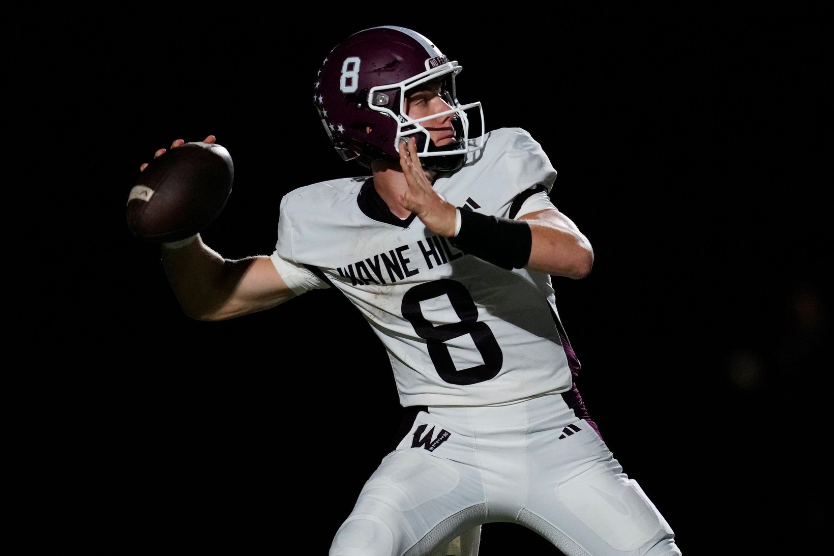 James Wolf gets ready to throw a pass to a Wayne Hills teammate,  Friday, Oct. 16, 2026, in Franklin Lakes.