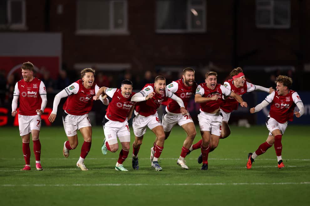 Fleetwood Town celebrate after penalty shoot-out win over Arsenal at Highbury